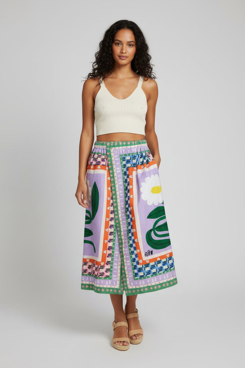 Colorful patterned pants with floral and abstract designs on a beige background