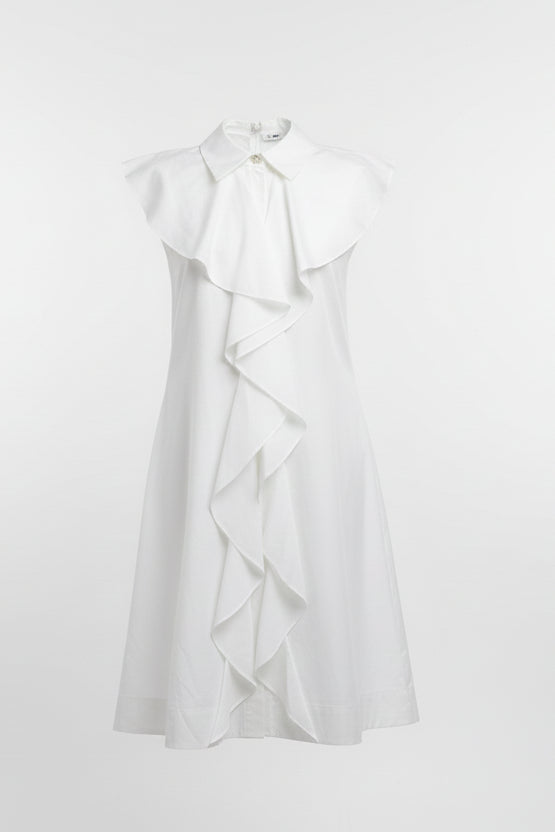 White ruffled dress on a light gray background